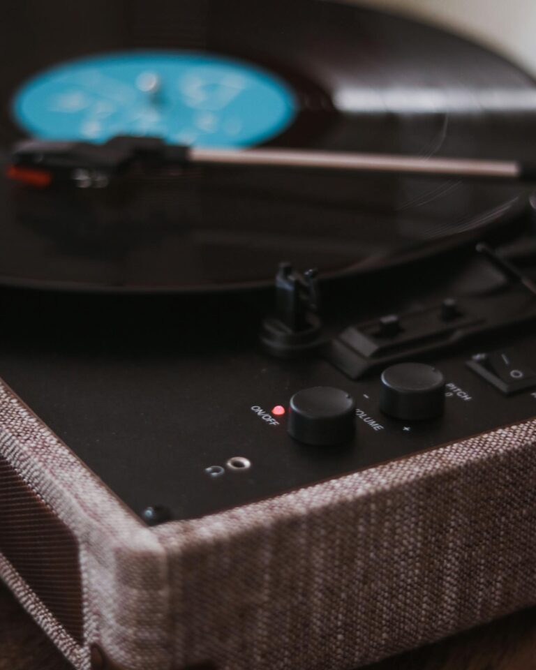 Close-up view of a turntable playing vinyl, highlighting analog warmth.